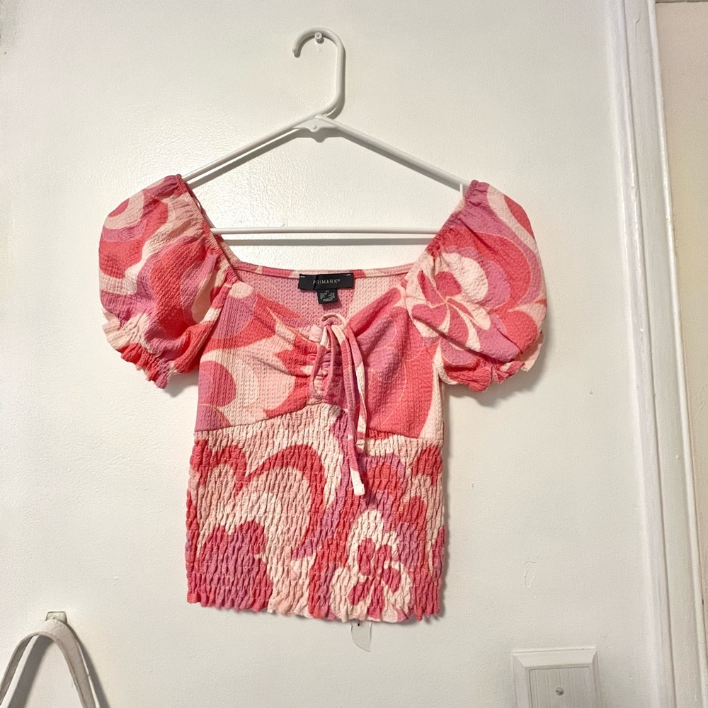 pink patterned top